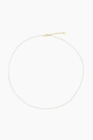 Tiny Pearl Necklace - Guld - Sorelle — produktfoto