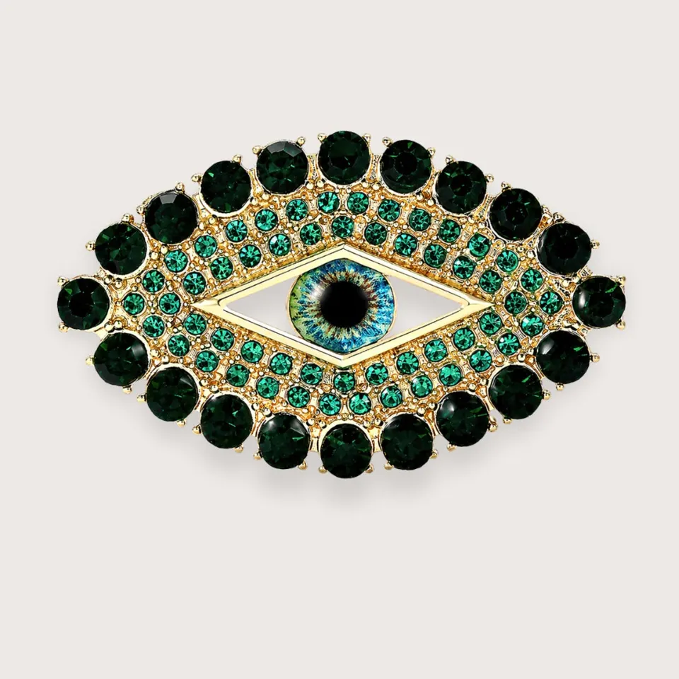 Sia øje-broche med grønne rhinsten - guldfarvet broche - Chant du Matin — produktfoto