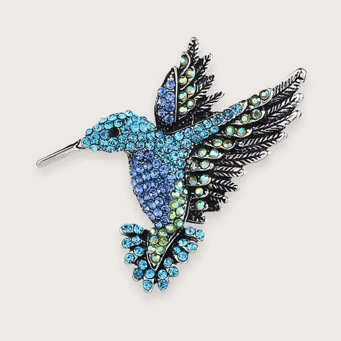 Y2K kolibri-broche med farvede rhinsten · 2026 TRENDS — produktfoto