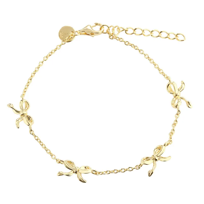 *CURVE BOW BRACELET | GOLDEN — produktfoto
